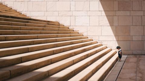 Boy at foot of steps