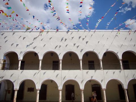 building with colourful flags